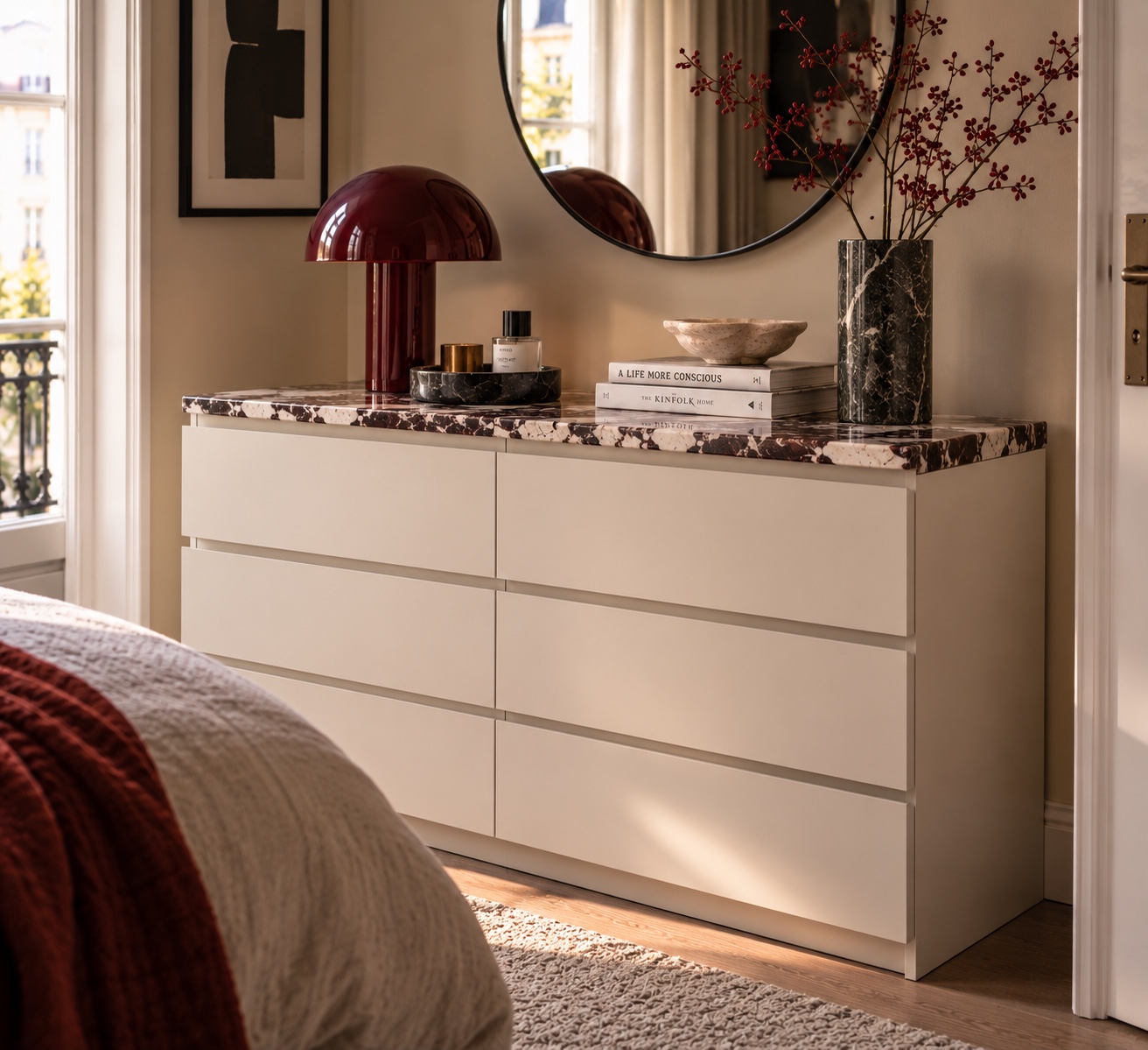 A simple dresser topped with heavily veined stone